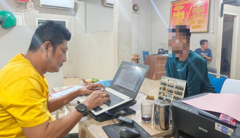 Foto pelaku saat di periksa