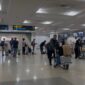 Caption: Arsip - Aktifitas di area check in Bandara SMB II Palembang. Foto: Tia