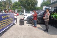 Sejumlah massa dari CACA Sumsel menggelar aksi unjuk rasa di depan Pengadilan Negeri (PN) Tipikor Palembang, Selasa (31/3/2026)