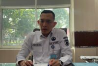 Kepala Badan Pengelola Keuangan dan Aset Daerah (BPKAD) Sumsel, Yossi Hervandi  saat diwawancarai di ruang kerjanya, Rabu (1/3/2026). Foto: Tia