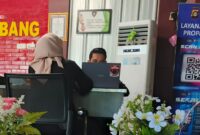 Korban Saat Melapor ke Polrestabes Palembang 