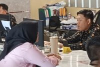 Koran Saat Melapor ke Polrestabes Palembang 