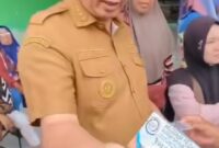 fhoto (istimewa/tangkapan layar tiktok@pagaralam.serame) : bukti pungli terselubung di pasar terminal nendagung yang resahkan pedagang dan kuli panggul