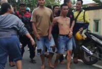 Foto : Pelaku saat digiring warga sentosa kec Su 2 palembang