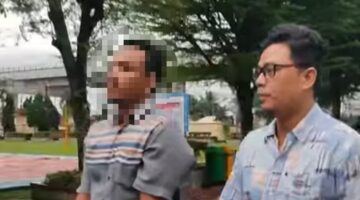 Foto : Pelaku digiring Polisi