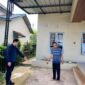 Petugas saat melakukan olah TKP di lokasi kejadian.