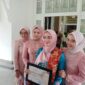 Foto : wadir LBH Bima Sakti usai menerima penghargaan dari Pemkot Kota Palembang