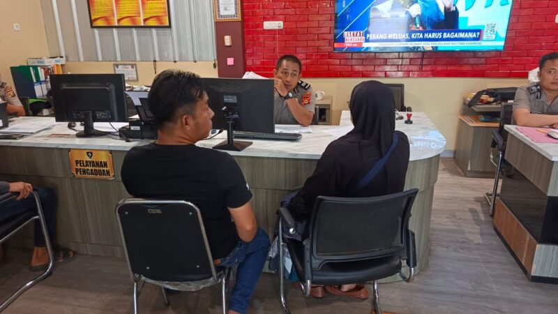 korban saat melapor ke SPKT polres palembang 