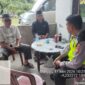 Personel Polsek Buay Madang Timur melaksanakan giat sambang dialogis dengan warga Desa Tanjung Mas. 