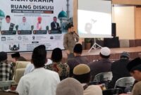 Caption Foto : Funding and Transaction Relationship Manager Area Palembang Bank Syariah Indonesia, Ariesta Aprilianto saat menyampaikan materi.