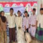 Penerima daging kurban dari Panti Yatim Piatu Al Kahfi saat kegiatan pembagian daging kurban yang digelar oleh Pengadilan Negeri Palembang Kelas IA Khusus, Jumat (29/5/2026).