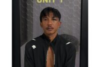 Tersangka saat diamankan.