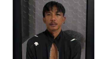 Tersangka saat diamankan.