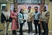 Foto : pihak yayasan membuat laporan di polda Sumsel