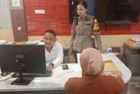 Foto.:  korban membuat laporan polisi