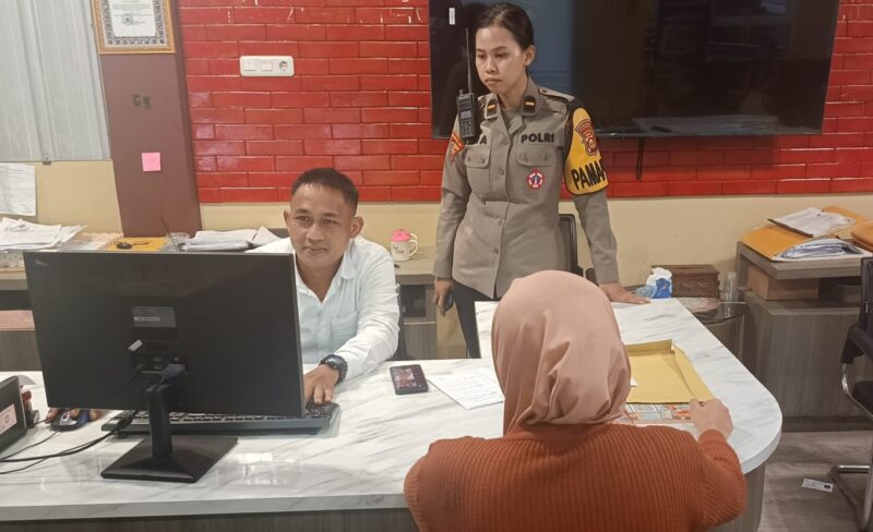 Foto.:  korban membuat laporan polisi