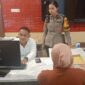Foto.:  korban membuat laporan polisi