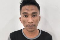 Tersangka saat diamankan.
