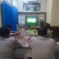 Polsek Buay Madang Timur Polres OKU Timur menggelar kegiatan Nonton Bareng (Nobar) Pesta Bola Dunia 2026 pada Minggu (21/06/2026) dini hari di Mako Polsek BMT.