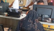 Foto korban membuat laporan polisi