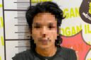 Pelaku saat diamankan polisi.