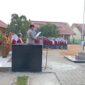 Ps Kanit Binmas Polsek Buay Madang Timur, Bripka Ari Wicaksono, membacakan amanat Dir Binmas Polda Sumsel saat bertindak sebagai Inspektur Upacara di SMAN 1 Buay Madang Timur, OKU Timur. 