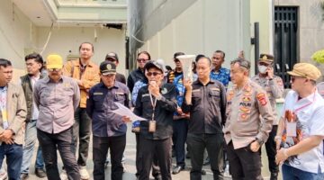 Foto Panitera PN Palembang, Dr. Sumargi, SH, MH saat melaksanakan Eksekusi kamis (17/9/2026)