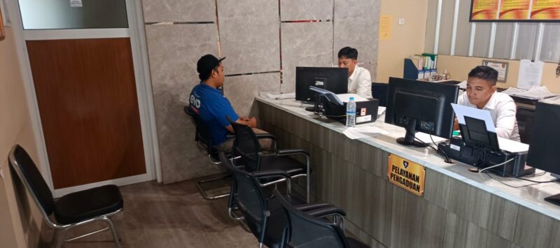 Foto : korban membuat laporan polisi