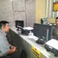 Foto korban membuat laporan polisi