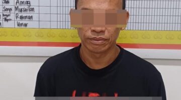 Pelaku saat diamankan.