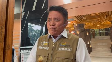 Gubernur Sumatera Selatan Herman Deru saat diwawancarai langsung.