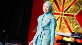 Foto. Hj., Ike Meilina Muchendi, saat mengenakan langsung kreasi tersebut dalam fashion show Kriyanusa 2026 di Jakarta Convention Center (JCC