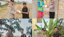Kapolsek Buay Madang Timur Iptu Swisspo, menyerahkan langsung paket makanan kepada warga di wilayah Desa Kumpul Rejo, OKU Timur.