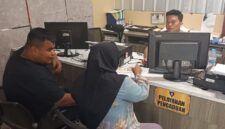 Foto korban membuat laporan polisi