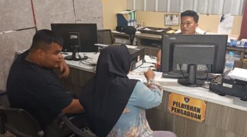 Foto korban membuat laporan polisi