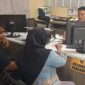 Foto korban membuat laporan polisi