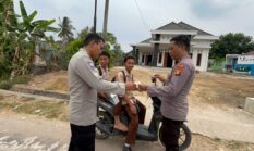 Bentuk Kepedulian Sosial, Polsek Buay Madang Timur Gelar Aksi Sedekah dan Berbagi Masker ke Masyarakat