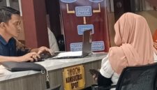 Foto : korban membuat laporan poliso