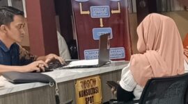 Foto :  korban membuat laporan poliso