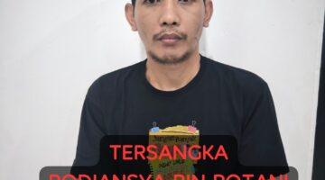 Tersangka saya diamankan. Foto: dokumen polisi.