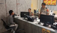 Foto korban membuat laporan Polisi