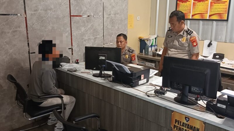 Foto korban membuat laporan Polisi